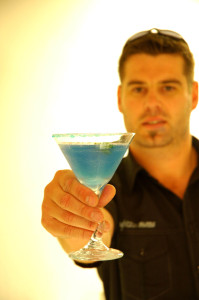 Bartender offering a drink