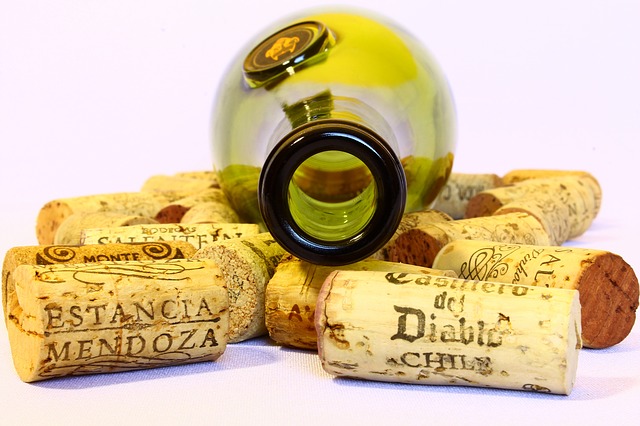 Empty wine bottle and corks