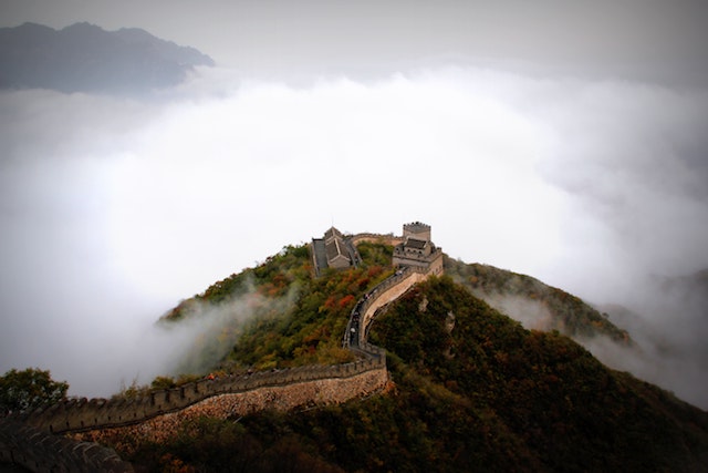 wall of China in the mist on a hill